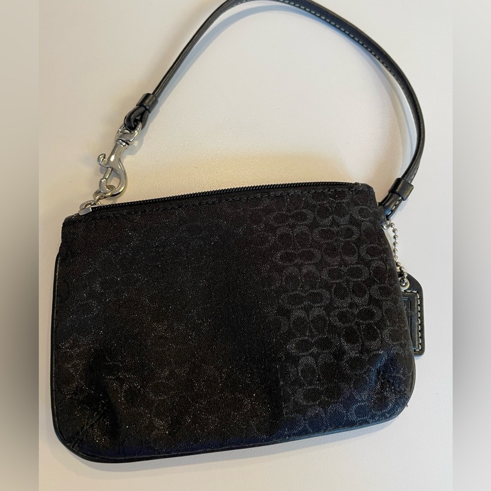 Coach black shimmer signature logo mini wristlet.